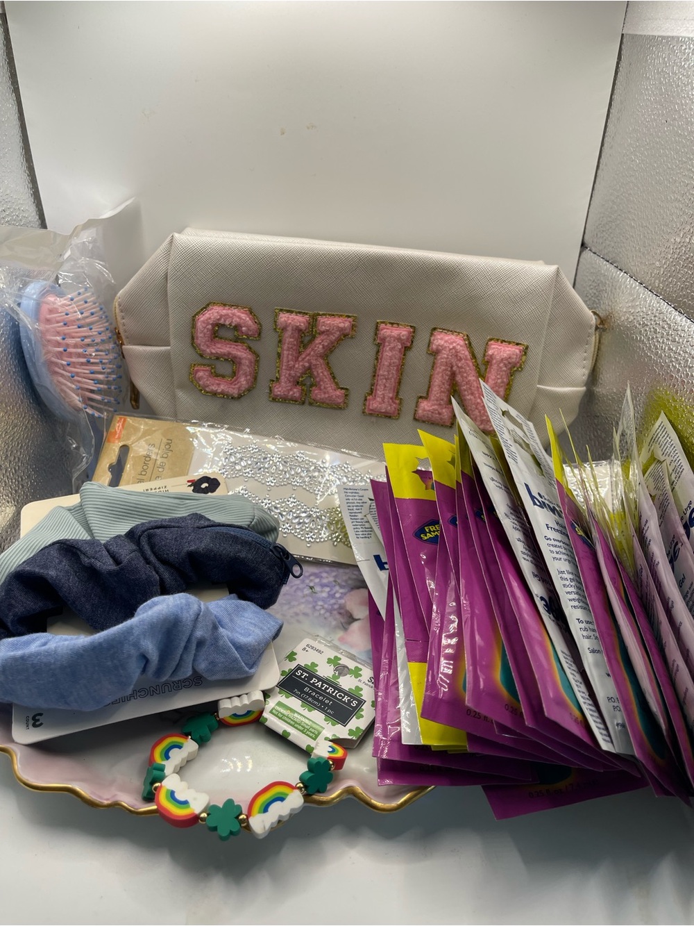 White‎ Cosmetic Pouch with Pink 'SKIN' Patch with hair accessories